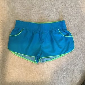 Blue and green swim shorts